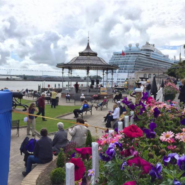 a crowd of people at a park