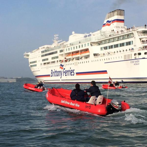 a small boat in a large body of water