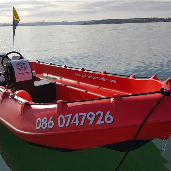 a small boat in a body of water