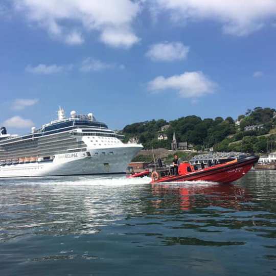 a small boat in a large body of water