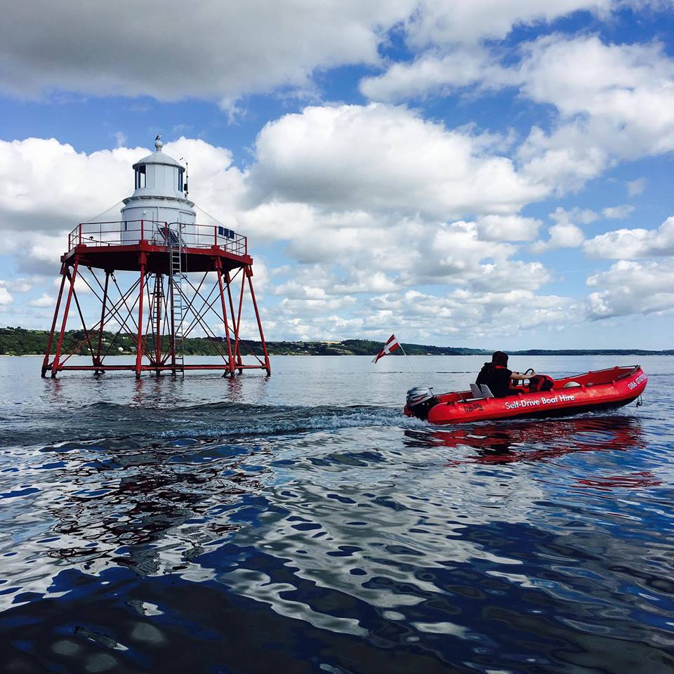 a small boat in a body of water